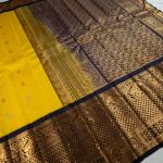 YELLOW SAREE WITH UMBER COLOUR BORDER